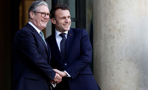 נשיא צרפת עמנואל מקרון וראש ממשלת בריטניה קיר סטאר (צילום: רויטרס)