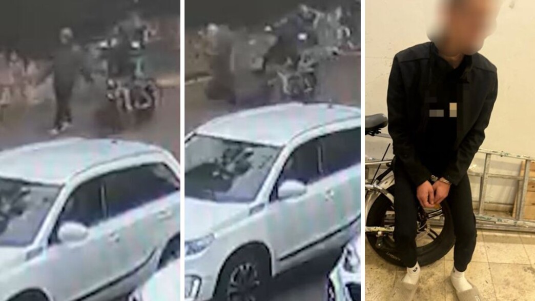 עובר עם האופניים החשמליים - ובועט בגב עובר עם האופניים החשמליים - ובועט בגב