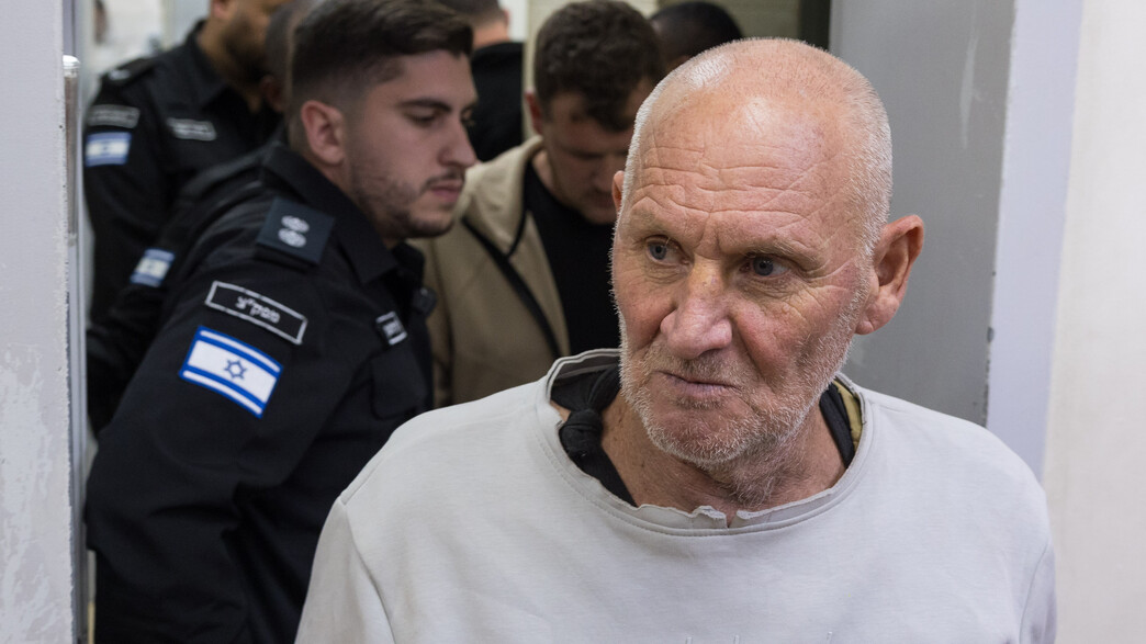 האב יצחק ובנו בועז החשודים בתקיפת שכנתם וכלבה האב יצחק ובנו בועז החשודים בתקיפת שכנתם וכלבה