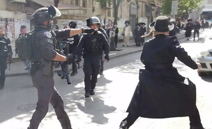 התקרית בין לוחמי מג"ב לחרדים במאה שערים (צילום: בצדק)