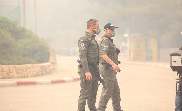 כוחות משטרה בזירות השריפה