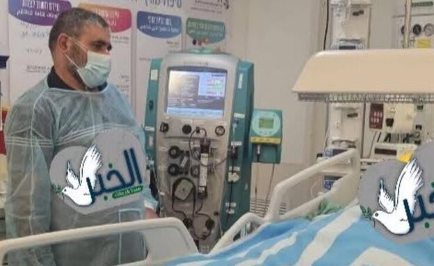 האב נפרד מבנו שנספה בשרפה בדיר אל אסד (צילום: שימוש לפי סעיף 27א' לחוק זכויות יוצרים)