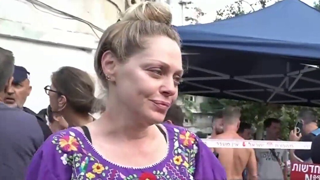 אסנת פישמן בזירת פגיעת הטיל 