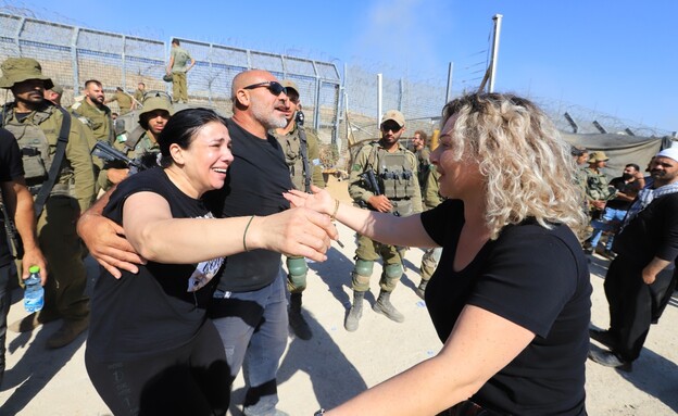 משפחות דרוזיות מישראל וסוריה מתאחדות בגבול (צילום: איתן אלחדז-ברק, TPS)