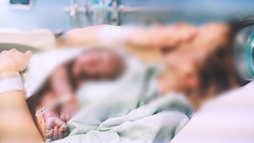 אישה אחרי לידה