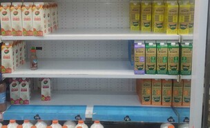 מחסור בחלב במכולות השכונתיות (צילום: mako)