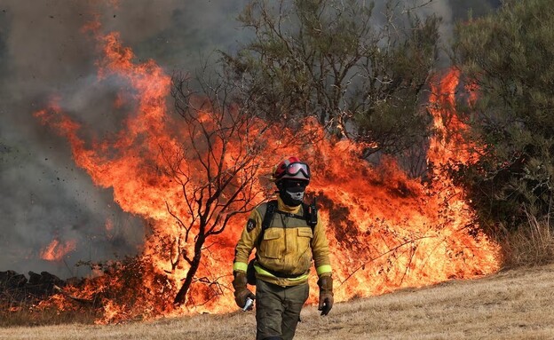 שרפות במחוז גליסיה בספרד (צילום: reuters)