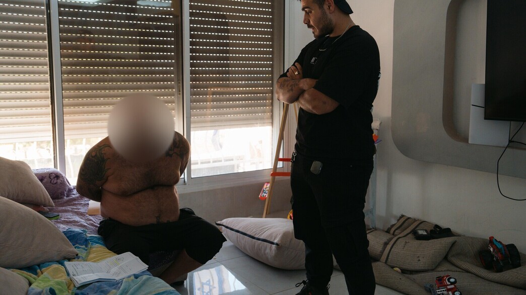 אחד החשודים בסחר בנשים בעת מעצרו אחד החשודים בסחר בנשים בעת מעצרו