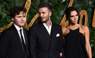 ויקטוריה בקהאם, דייוויד בקהאם, ברוקלין בקהאם (צילום: 	Jeff Spicer/BFC, getty images)