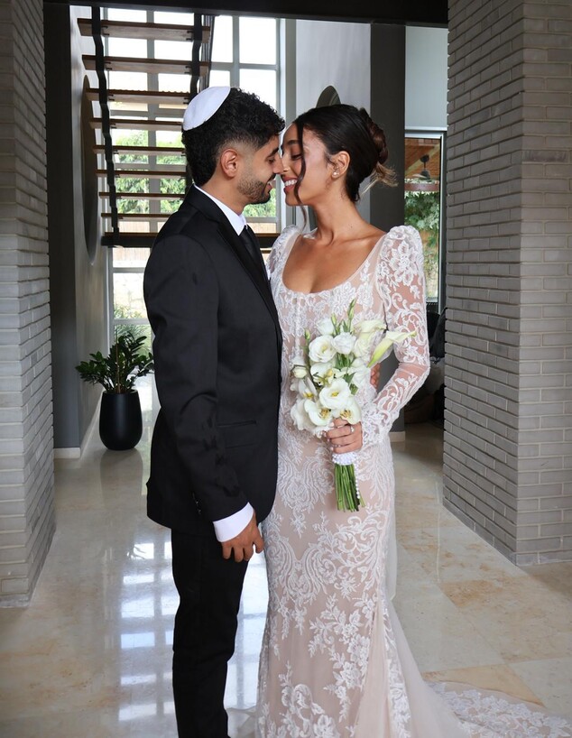 עמית גניש ובן זוגה עירד ביום חתונתם