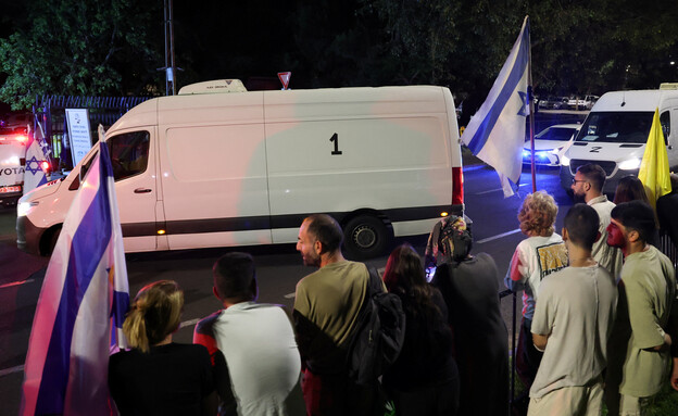 שיירת החטופים החללים (צילום: Reuters)