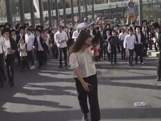 בשידור חי: כתבת חדשות 12 הותקפה בידי חרדים