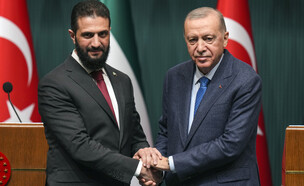 נשיא טורקיה ארדואן ונשיא סוריה אל ג'ולאני (צילום: AP)
