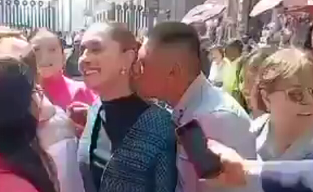 גבר זר חיבק ונישק בגסות את הנשיאה קלאודיה שיינבאום