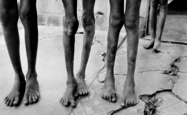 רגליים של מוזמלמנים (צילום: Tom Stoddart Archive, GettyImages IL)