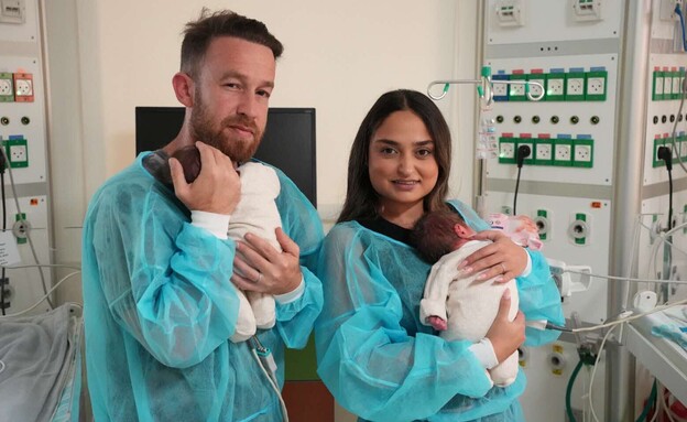 תמר פרידמן עם בעלה יגאל והתאומים