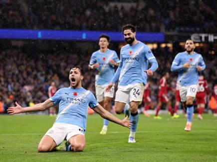 וחגג את שער הליגה ה-14 שלו העונה (Photo by Carl Recine/Getty Images)