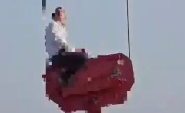 נער שנלכד על עגורן בראש מבנה בן 36 קומות (צילום: לפי סעיף 27 א')