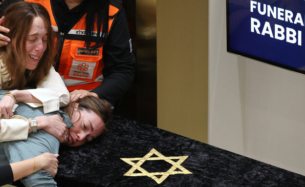 הלווייתו של הרב אלי שלנגר ז"ל באוסטרליה (צילום: AP)