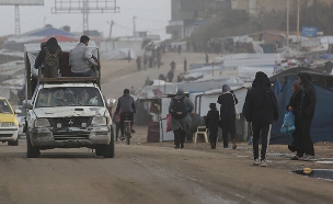 עזתים ברצועה (צילום: BASHAR TALEB/AFP via Getty Images)