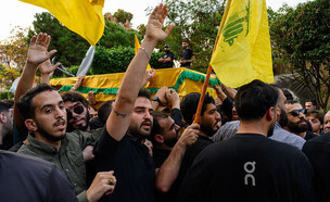 פעילי הארגון בלוויה (צילום: Scott Peterson/Getty Images)