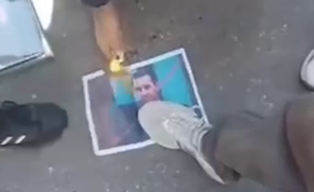 הצתת תמונתו של אסד בטרטוס