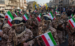 הכוח האכזרי באיראן (צילום: HOSSEIN BERIS/Middle East Images/AFP via Getty Images)