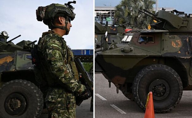 משוריינים וכוחות בגבול (צילום: Raul ARBOLEDA / AFP via Getty Images)