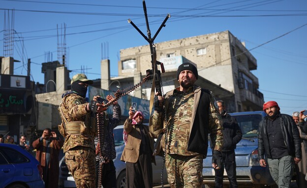 כוחותיו של א-שרע השתלטו על מחוזות כורדיים (צילום: AP)
