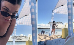 אמא תינוק חוף (צילום: לפי סעיף 27א' לחוק זכויות יוצרים)