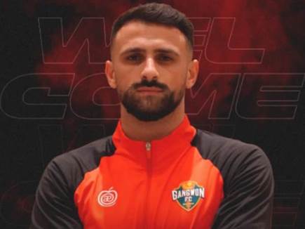 חתם בדרום קוריאה. חליחל וסוכנו אריאל בוזורגי (צילום: ספורט 5)