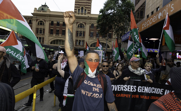 גלובלייז דה אינתיפאדה שלטים נגד הרצוג אוסטרליה