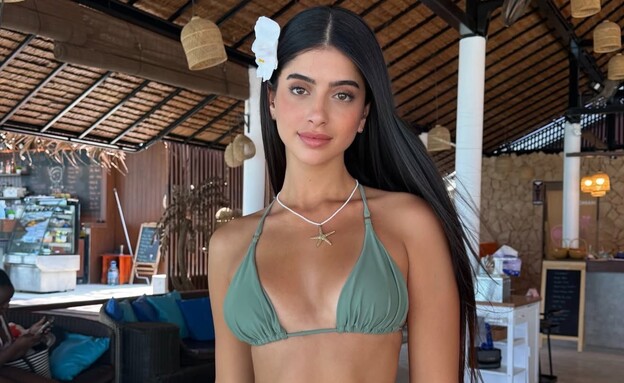 נת'ניאל בוזוליק ובת הזוג החדשה