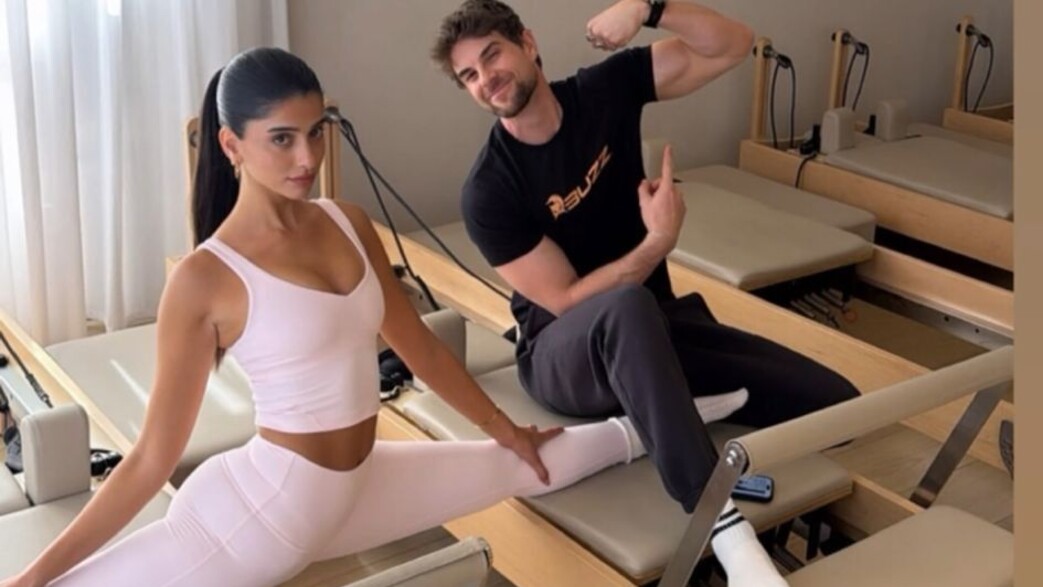 נת'ניאל בוזוליק ובת הזוג החדשה