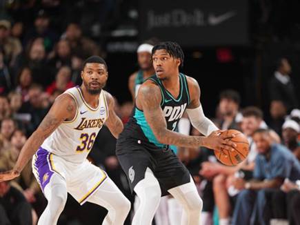 כיילב לאב ומרקוס סמארט. מודלים לחיקוי (Soobum Im/NBAE via Getty Im (צילום: ספורט 5)