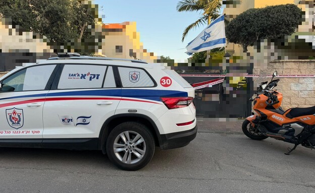 זירת פליטת הכדור ביישוב אזור (צילום: זק"א)