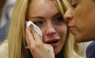 לינדזי לוהן, 2014 (צילום: DAVID MCNEW/AFP via Getty Images)