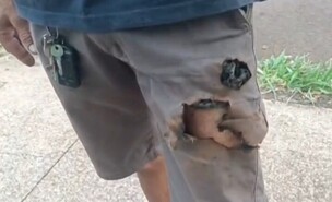 ניצל על ידי טלפון שהתפוצץ (צילום: odditycentral)