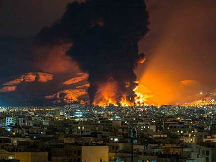 טהרן בלהבות. העשן יגיע עד לאמריקה? (GETTY) (צילום: ספורט 5)