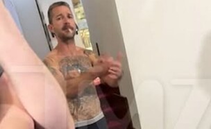 שיה לה-בוף בלובי המלון באיטליה (צילום: TMZ.com)