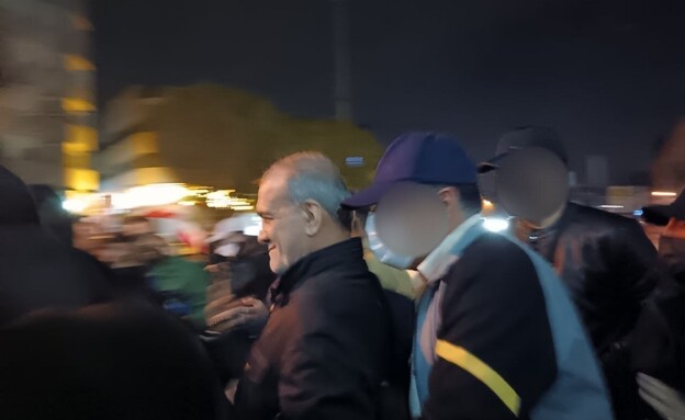 מסעוד פזשכיאן ועבאס עראקצ'י בהפגנות תמיכה במשטר