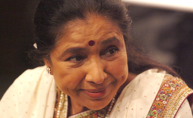 אשה בהוסל (צילום: J. Quinton/WireImage)