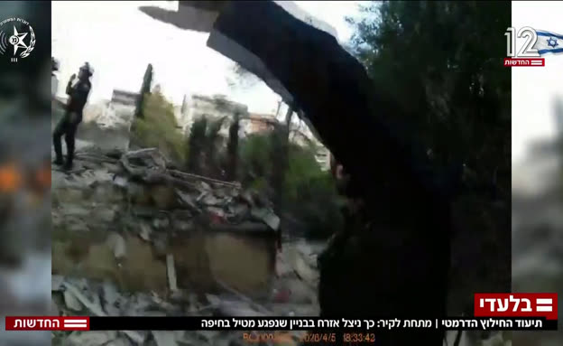 תיעוד החילוץ הדרמטי בחיפה לאחר פגיעת הטיל
