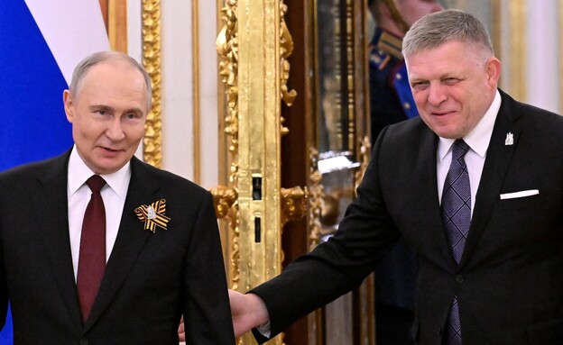 ראש ממשלת סלובקיה רוברט פיצו בפגישה עם פוטין (צילום: Reuters)