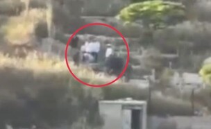 ההוצאה מהקבר שעוררה סערה (צילום: מתוך תיעוד שעלה ברשתות החברתיות, שימוש לפי סעיף 27א' לחוק זכויות יוצרים)