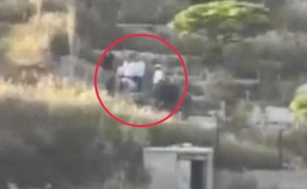 ההוצאה מהקבר שעוררה סערה (צילום: מתוך תיעוד שעלה ברשתות החברתיות, שימוש לפי סעיף 27א' לחוק זכויות יוצרים)