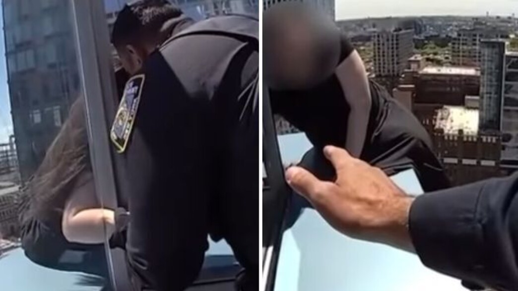 תיעוד חריג: שוטרי משטרת ניו יורק הצילו אישה שאיימה לקפוץ מגורד שחקים