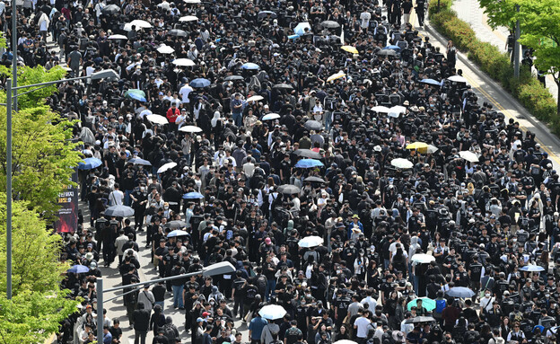 מחאה של עובדי סמסונג (צילום: getty images)