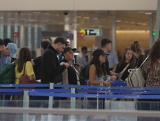 נתב"ג - המתדלקים האמריקנים שהשתלטו על נמל התעופה (צילום: N12) נתב"ג - המתדלקים האמריקנים שהשתלטו על נמל התעופה (צילום: N12)