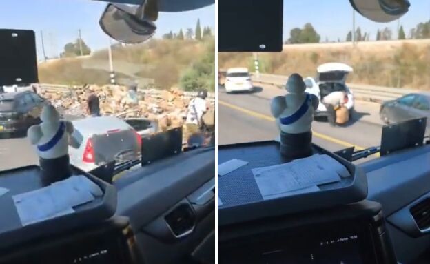עוברי אורח בוזזים משאית אחרי תאונה ליד ראשל"צ (צילום: רשתות חברתיות לפי סעיף 27א')